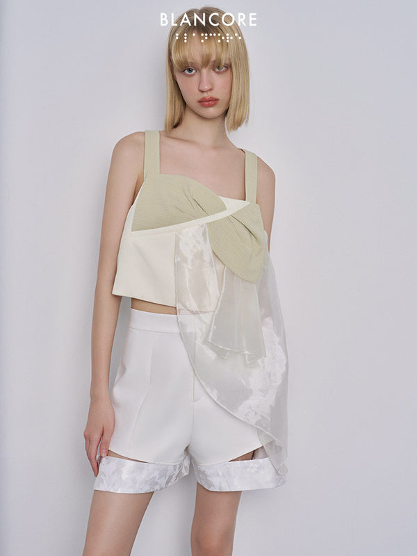 Asymmetrical mesh paneled vest