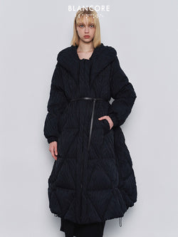Volume quilted down jacket
