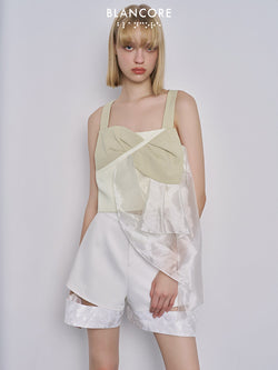 Asymmetrical mesh paneled vest