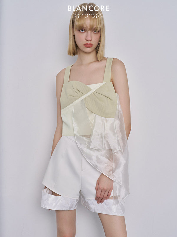 Asymmetrical mesh paneled vest