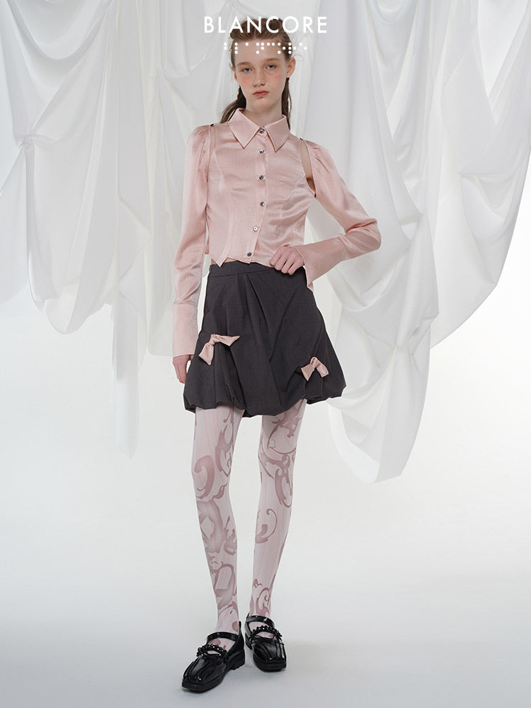Asymmetrical ruched "bud" shorts with bow