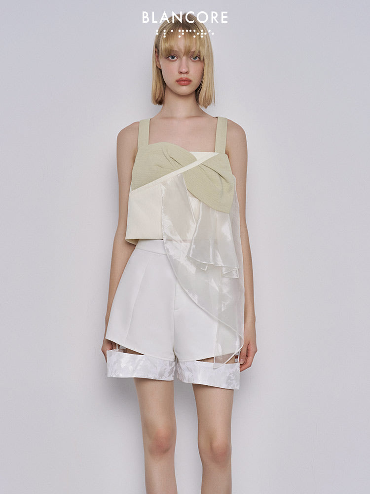 Asymmetrical mesh paneled vest