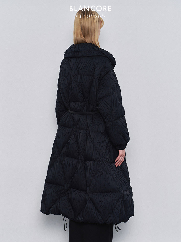 Volume quilted down jacket