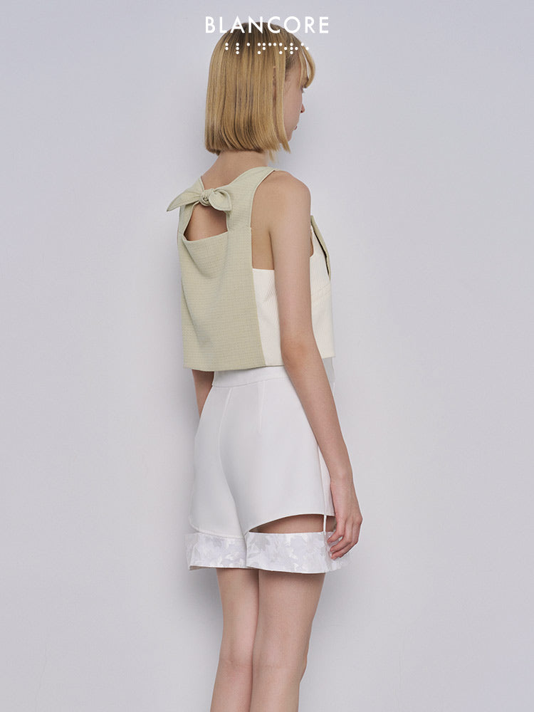 Asymmetrical mesh paneled vest