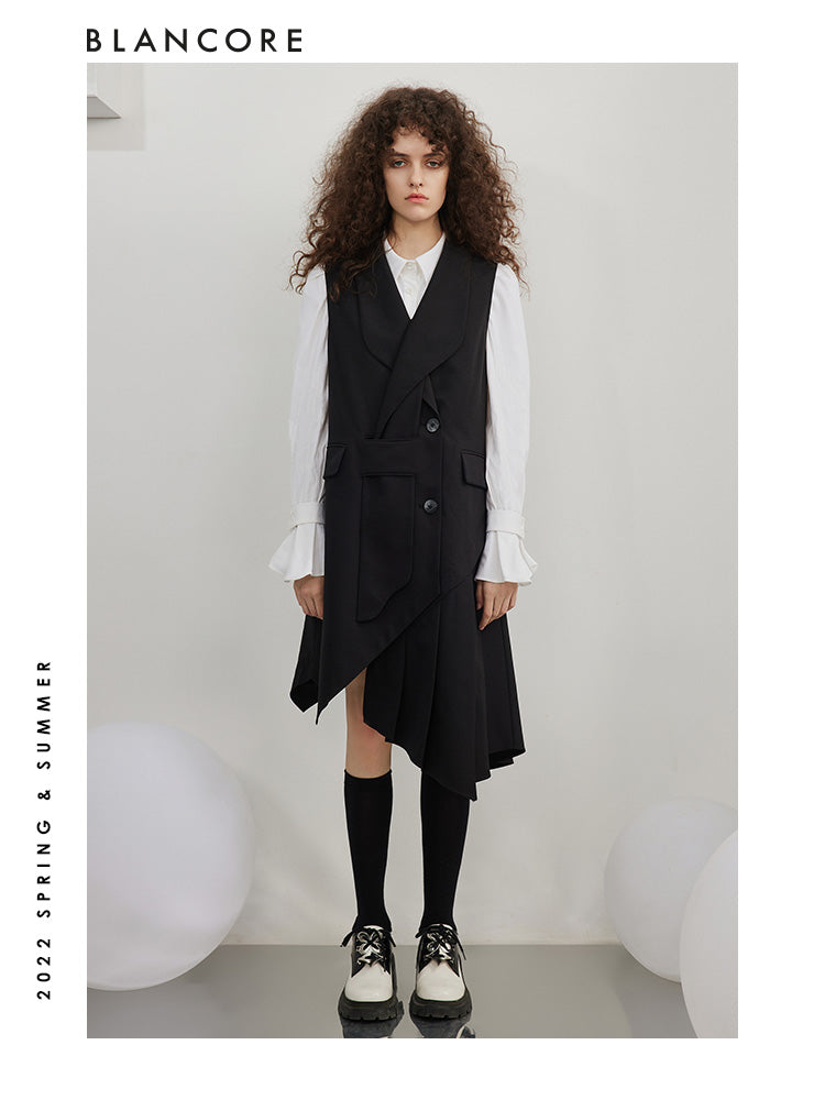 Asymmetrical pleated vest dress with open-back detail