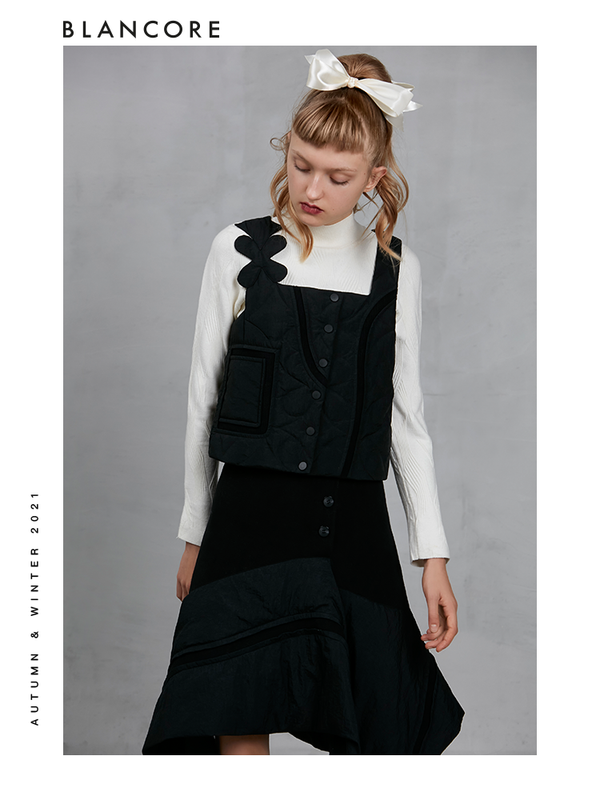 BOW BACK DOWN VEST WITH ASYMMETRIC SHOULDER DETAIL