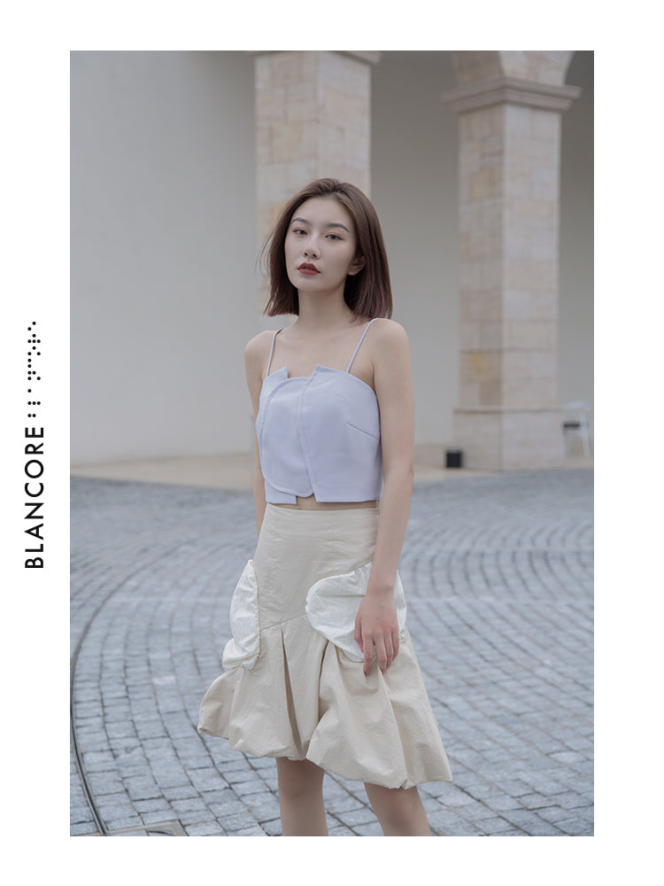 VOLUME PLEATED SKIRT
