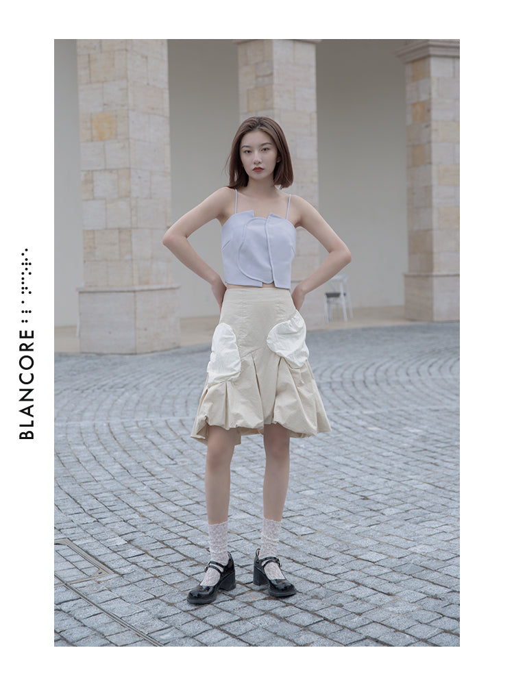 VOLUME PLEATED SKIRT