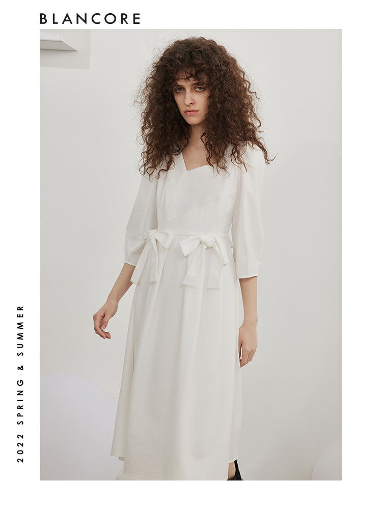 open-waist midi dress with large bow-embellished detail