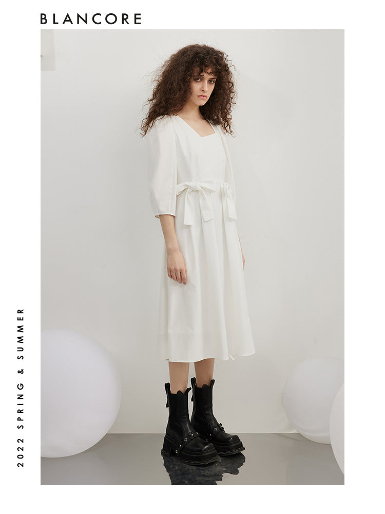 open-waist midi dress with large bow-embellished detail