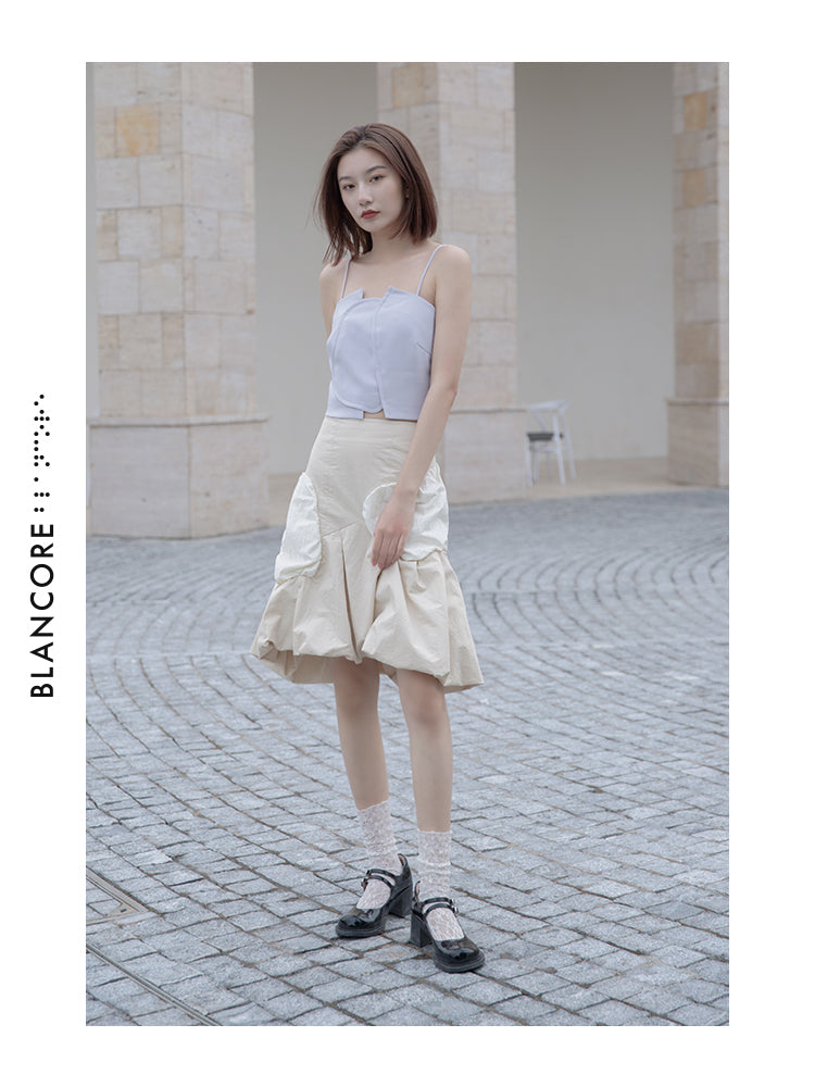 VOLUME PLEATED SKIRT
