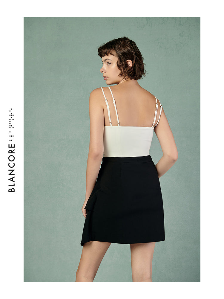CURVED PLEATED SKIRT