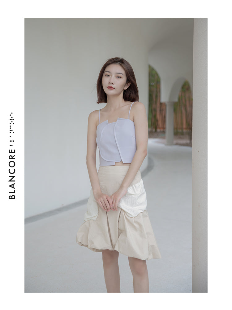VOLUME PLEATED SKIRT