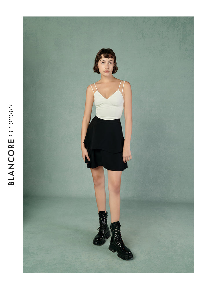 CURVED PLEATED SKIRT