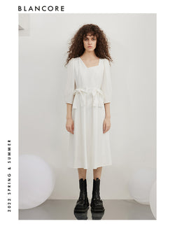 open-waist midi dress with large bow-embellished detail