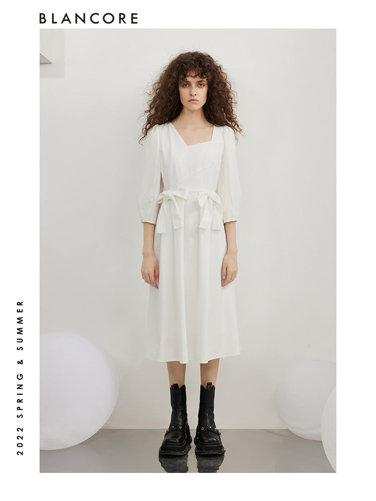 open-waist midi dress with large bow-embellished detail