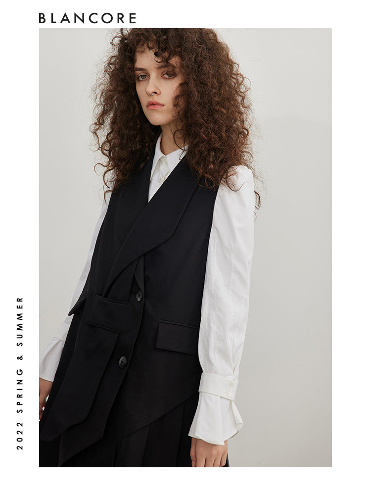 Asymmetrical pleated vest dress with open-back detail