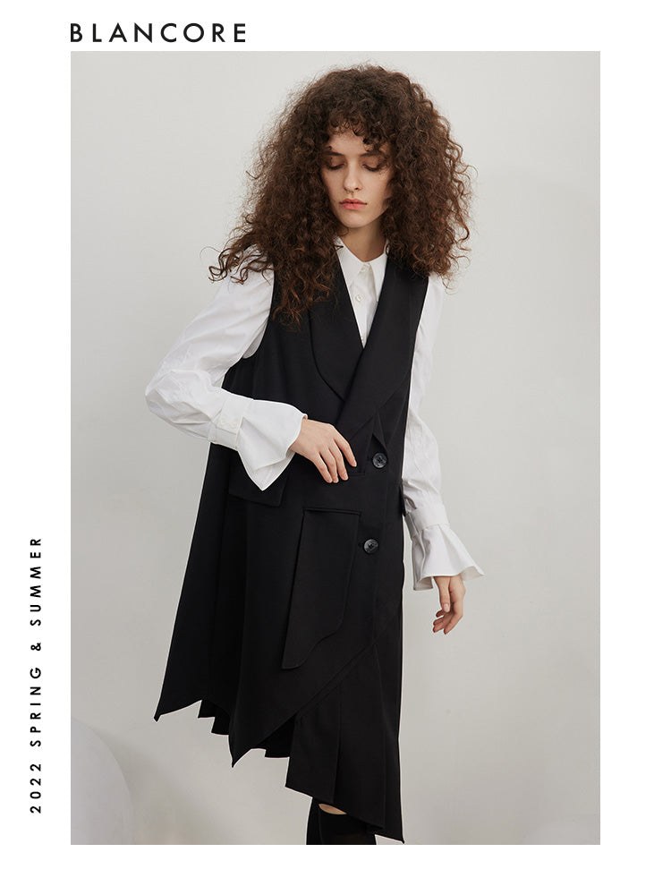 Asymmetrical pleated vest dress with open-back detail