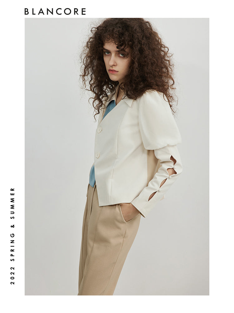 Tapered trousers with ankle detail