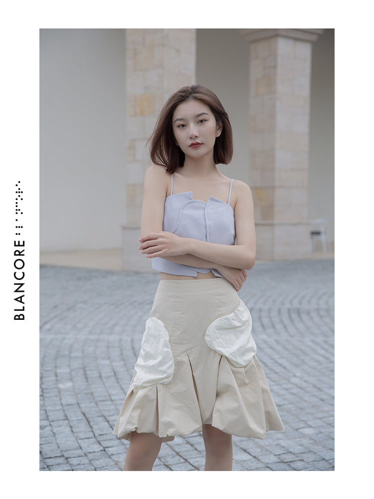 VOLUME PLEATED SKIRT