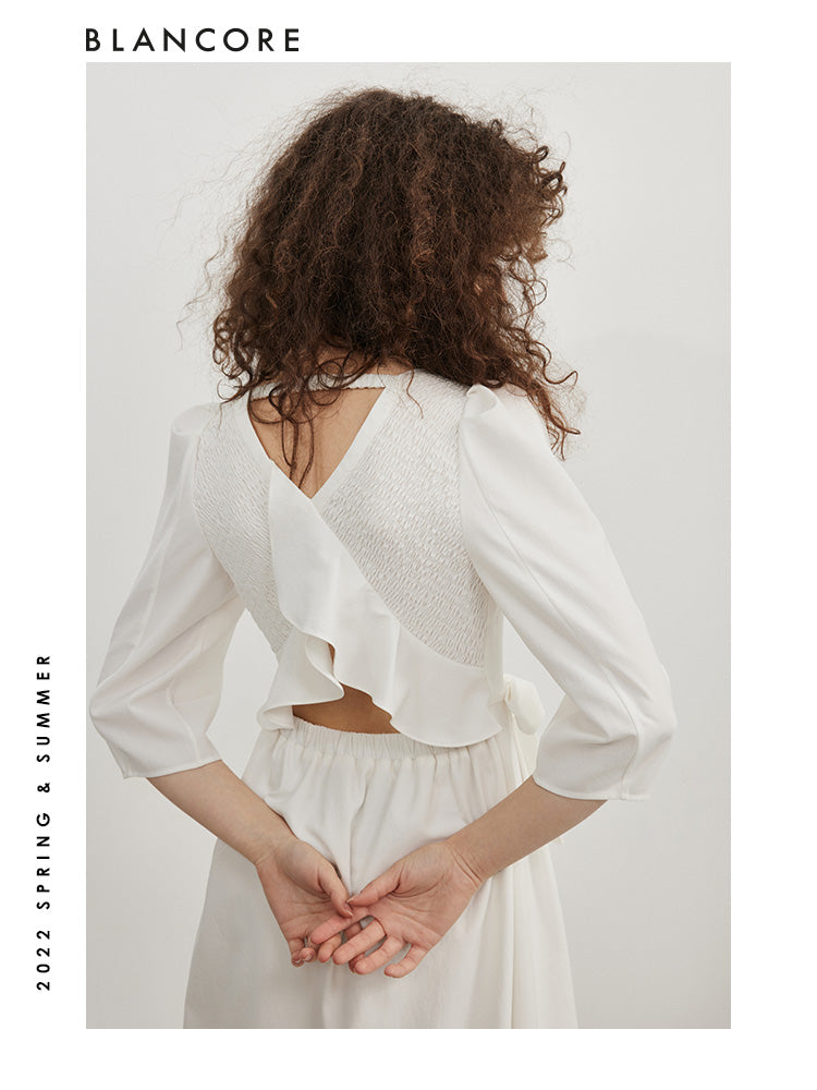 open-waist midi dress with large bow-embellished detail
