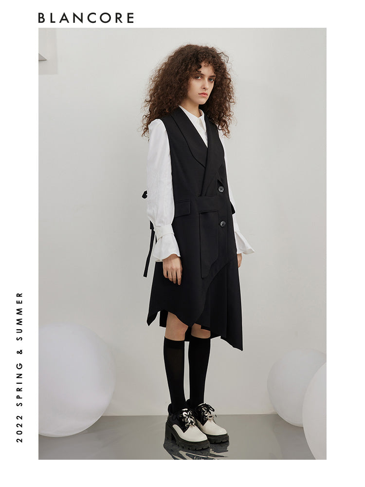 Asymmetrical pleated vest dress with open-back detail