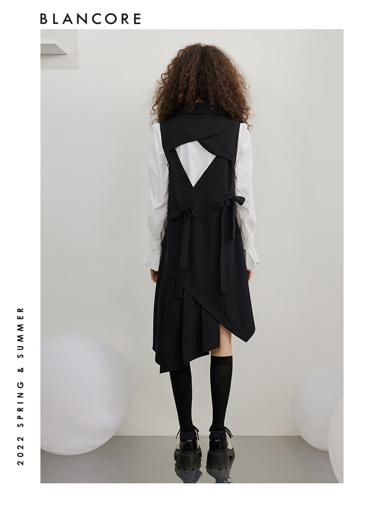 Asymmetrical pleated vest dress with open-back detail